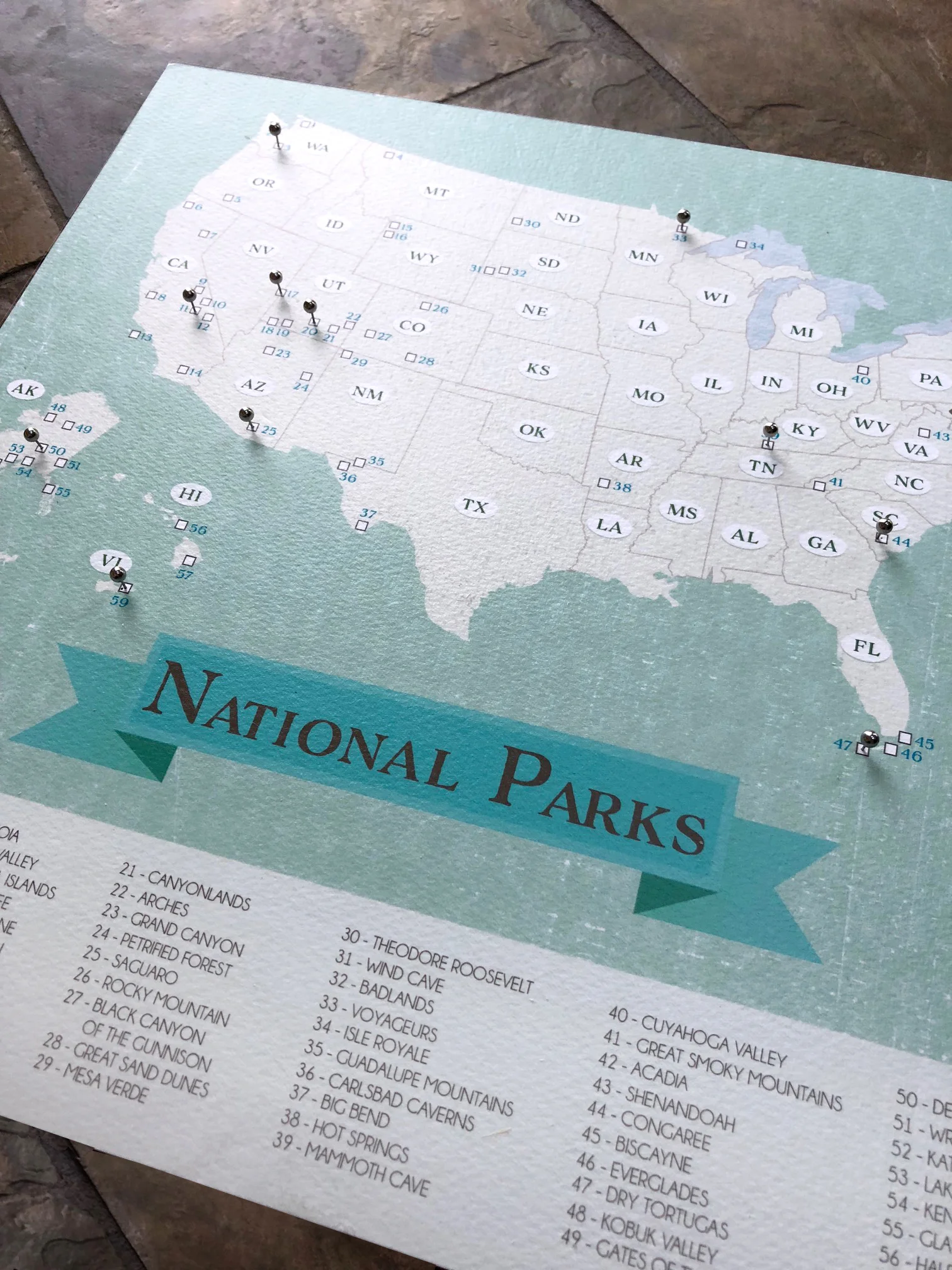 OUr national parks map is a hit. Mark your travels to the parks with a pin or a pen. Available Here .