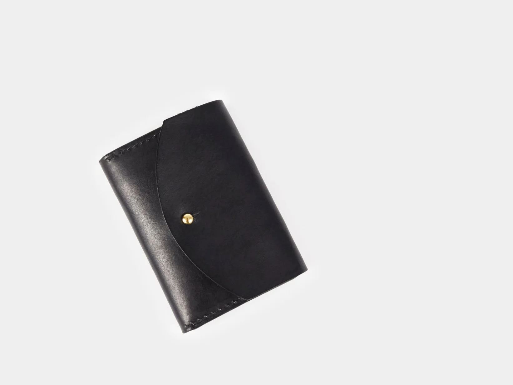 Round_Half_Wallet-Black-Flat.jpg