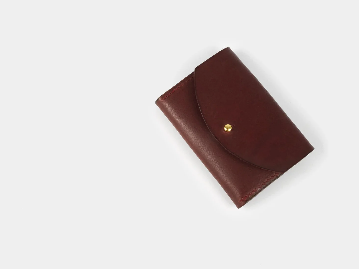 Round_Half_Wallet-Mahogany-Flat.jpg