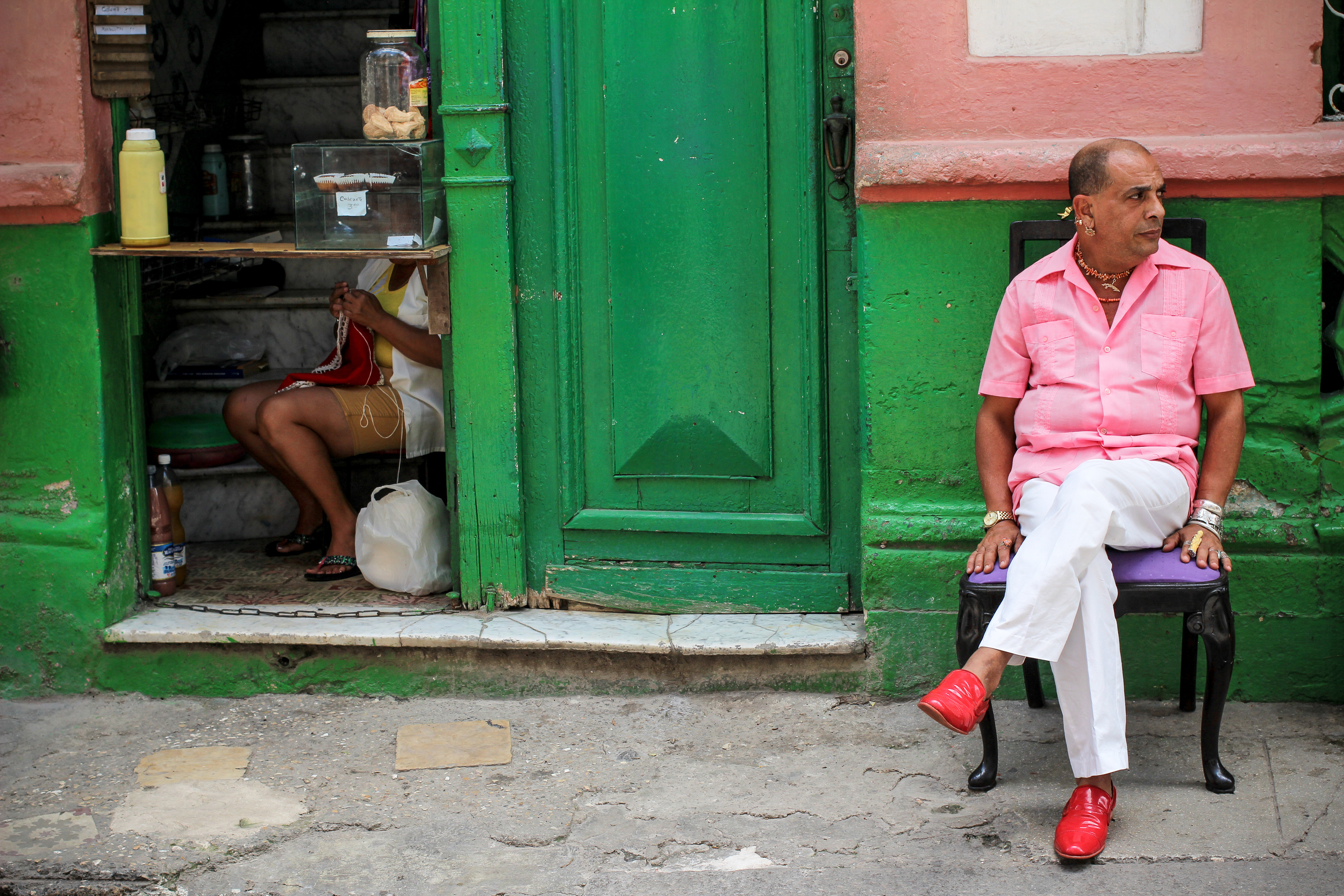 "Tommy" 2012 Tommy, former ballet dancer and instructor alongside Alicia Alonzo and Carlos Acosta, sits outside of his home’s restaurant, or paladar, to begin each day with tea and people watching. Paladares are fundamentally directed to serve a more vivid interaction with homestyle, Cuban food. La Guarida, the most famous paladar in all of Cuba, is open for business just down the road.