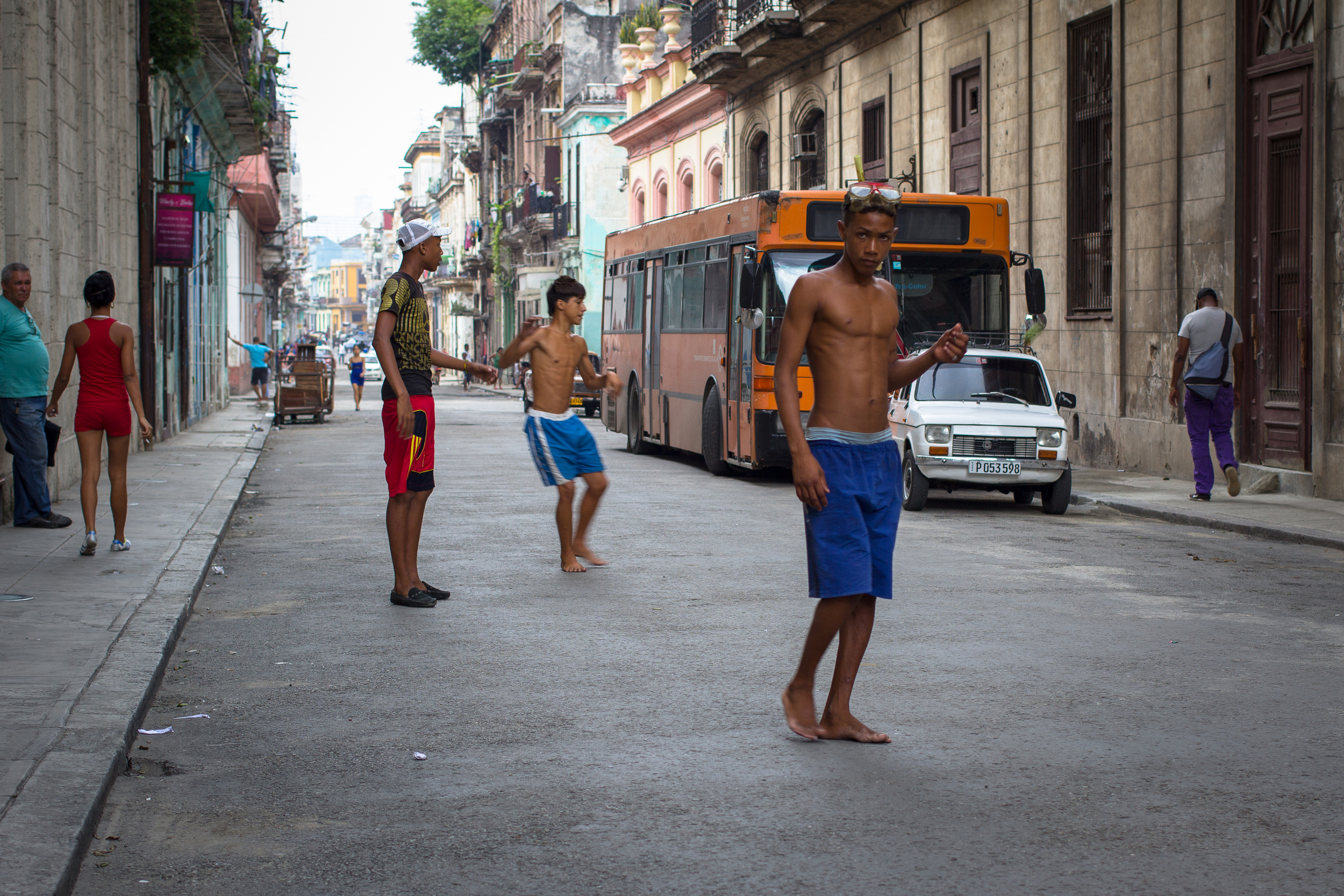 "Pelota" 2013 Boys play pelota, or hand ball, a popular street game among Latin American countries: Argentina, Chile, Uruguay, and Cuba.
