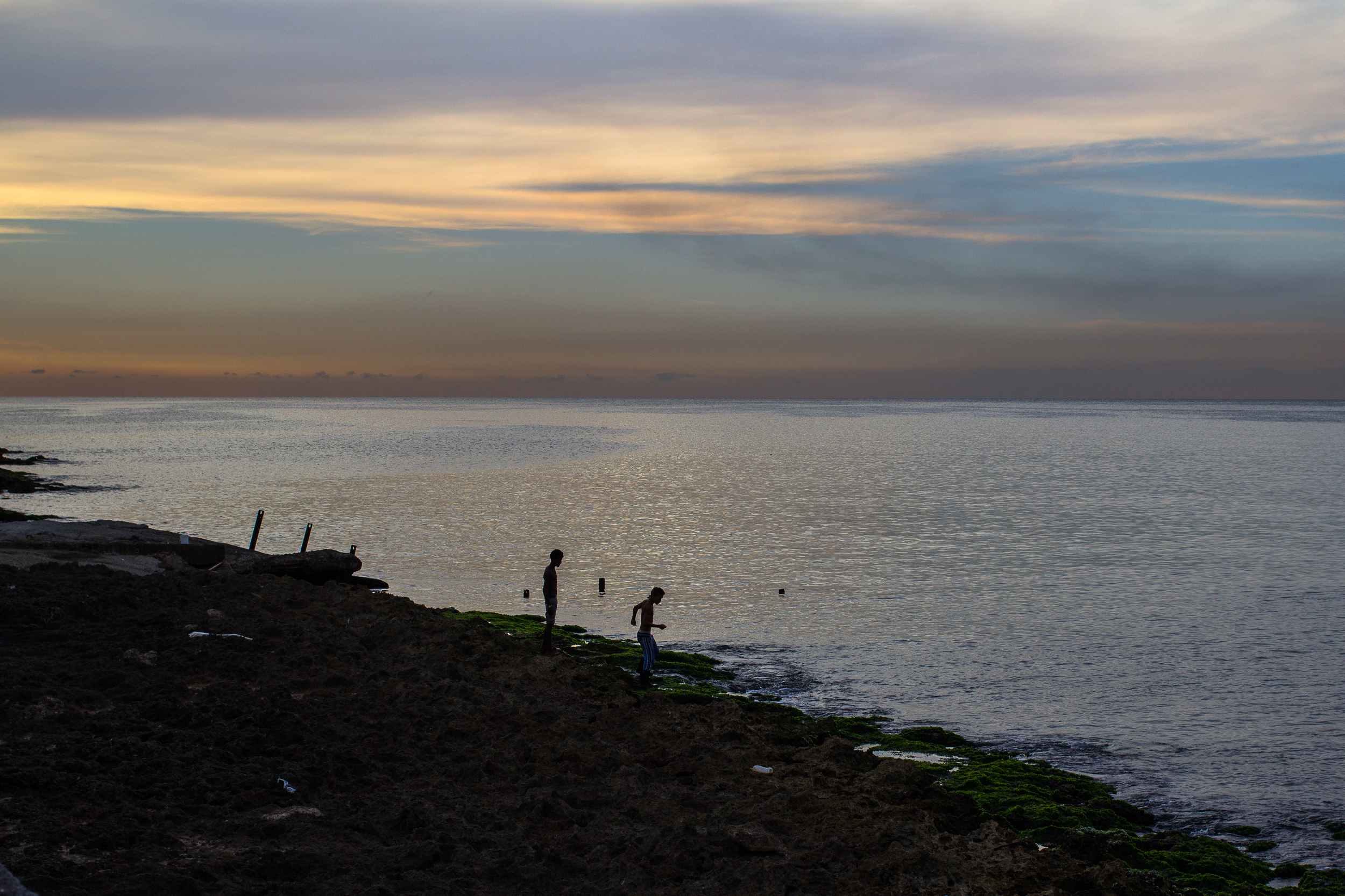 "Untitled" (Malecon Kids Swimming) 2015 Walking the Malecon during sunset, kids play and swim before night fall. 