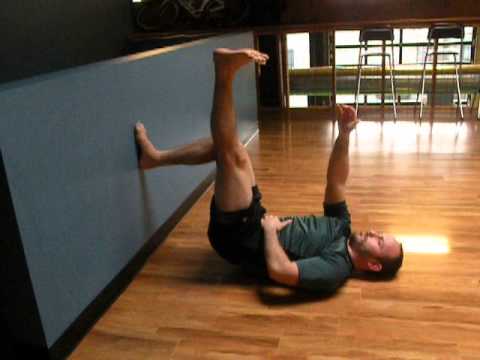 90:90 Bridge with Supported Wall Leg Lift and Arm Reach