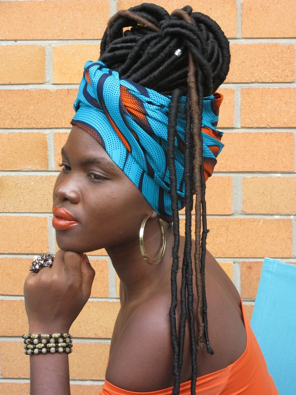 Mariama's braids pretty much guided the way we styled headwrap ANIKA and influenced our mood board - a casual and yet chic look.