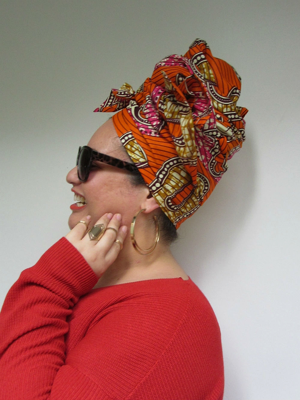 In line with our mood board, MEL G chose a burnt orange loose-fitting jumper which certainly made the colours in headwrap MACY pop even more.