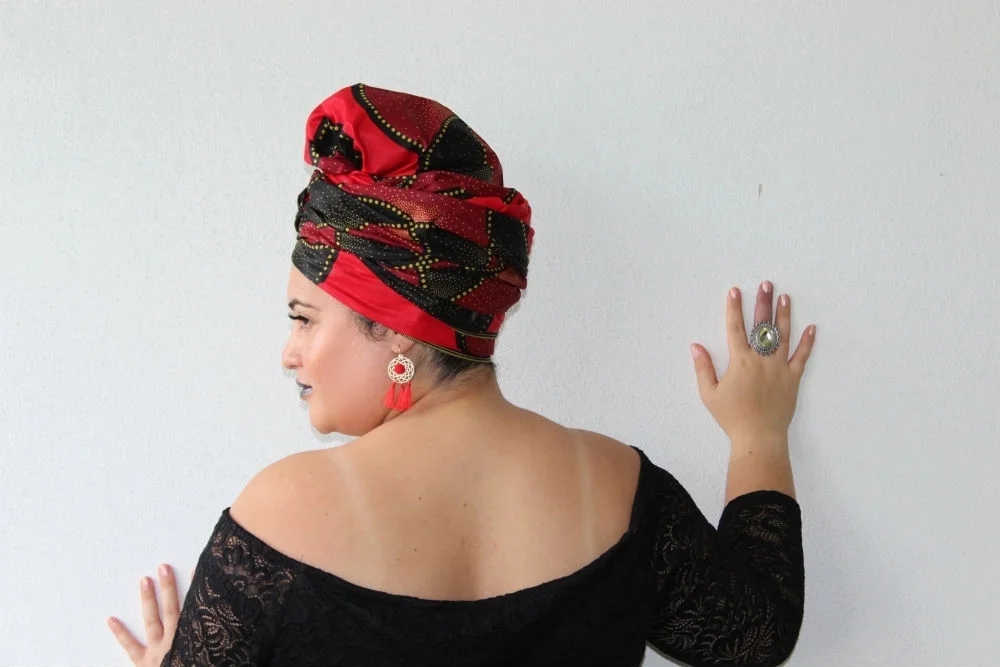 Headwrap ISHA ... Mel was the ideal brand ambassador to rock this crown infused with our favourite colours, red, black and gold. Tassel earrings and ring from Lovisa Jewellery compliment this sophisticated look. Black lipstick from the Nyx Cosmic Metals lip cream range was the ideal choice to complete this styling.