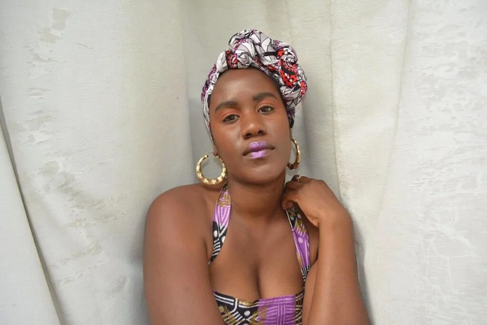 Our ankara head wrap designs are very colourful. Faro did a wonderful job of teaming our head wrap SHASHI with an equally colourful outfit.