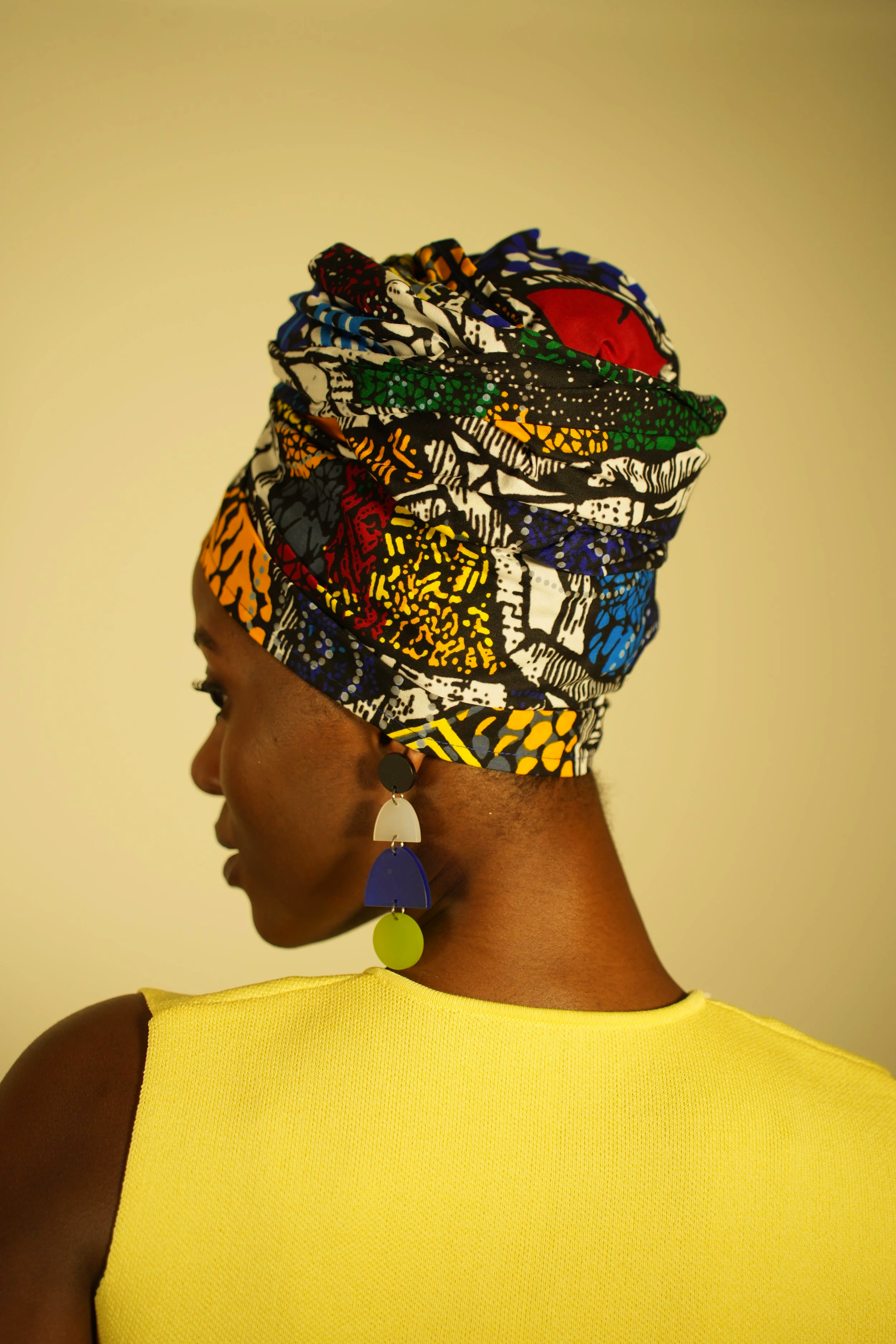 Back view of woman wearing a headwrap