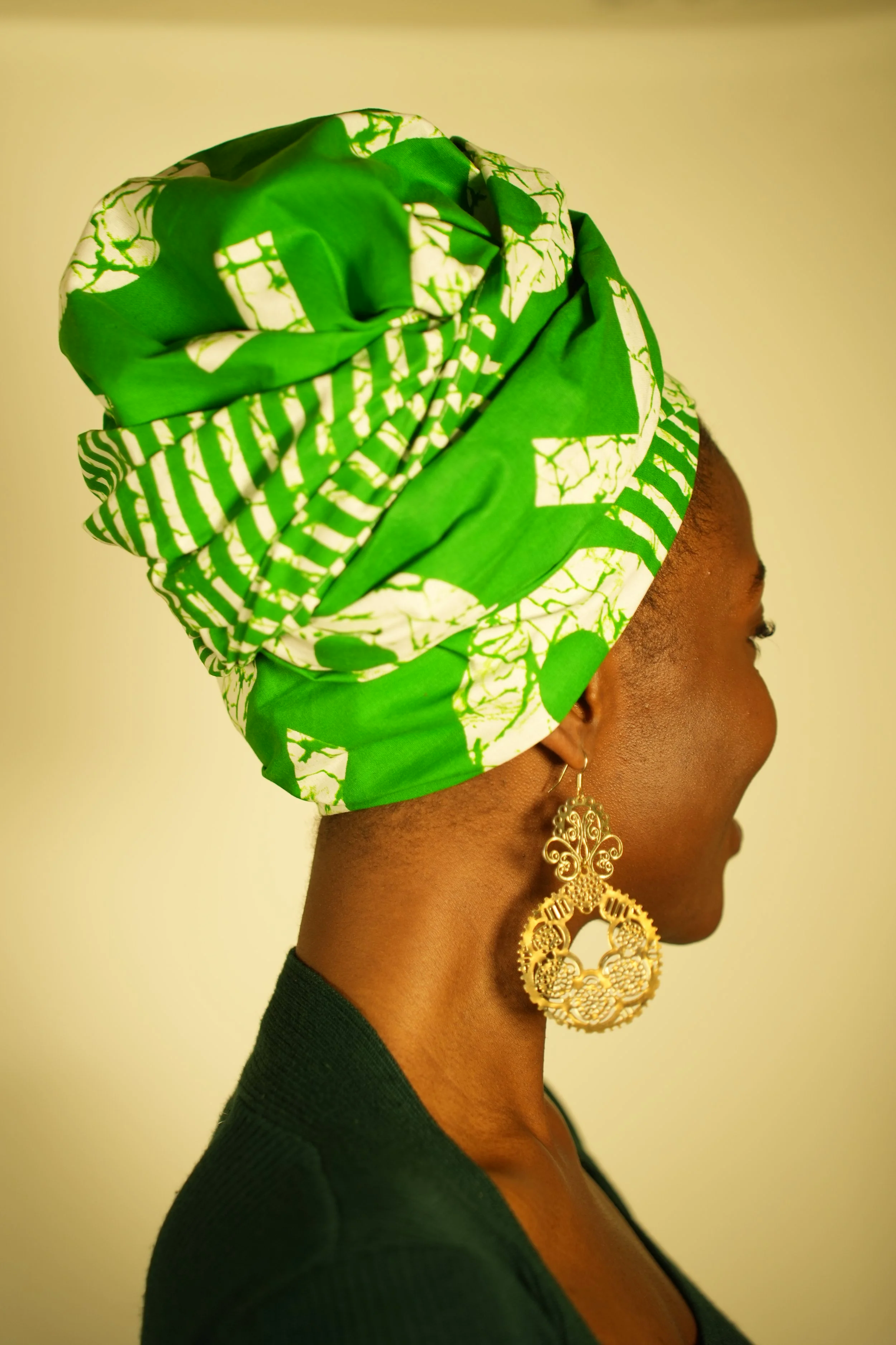 Side view of woman wearing a headwrap