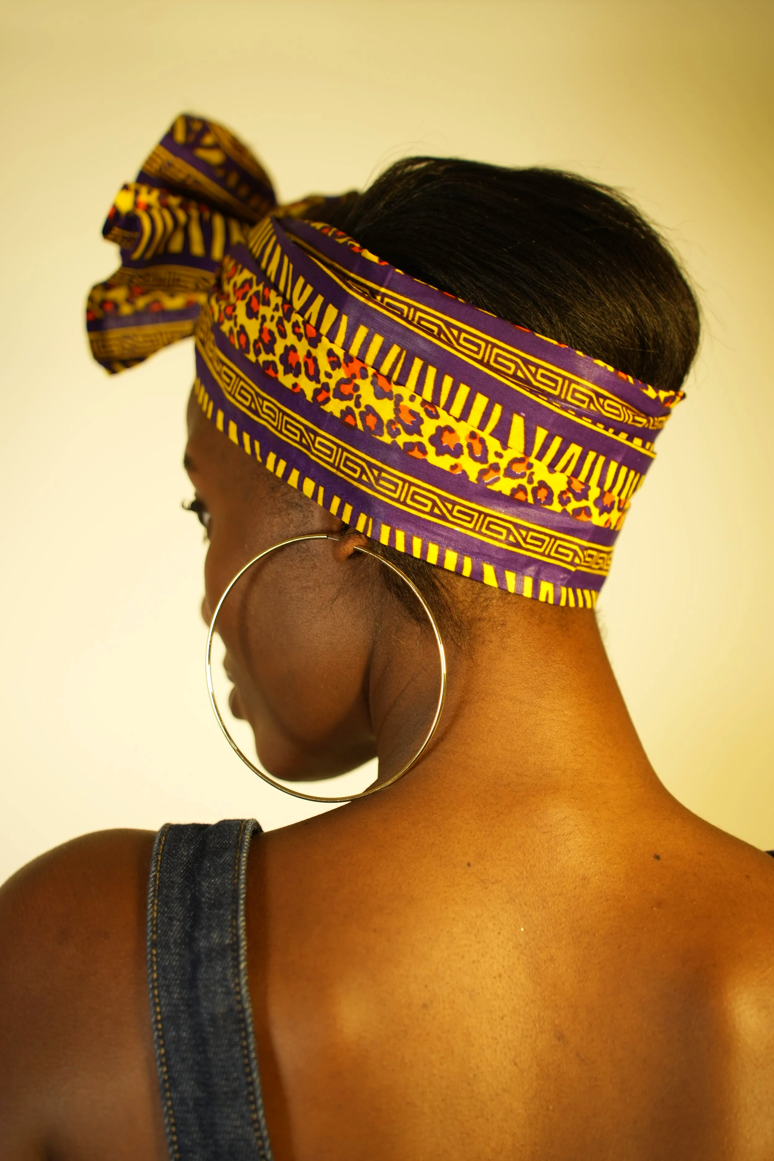 Back view of woman wearing a headwrap