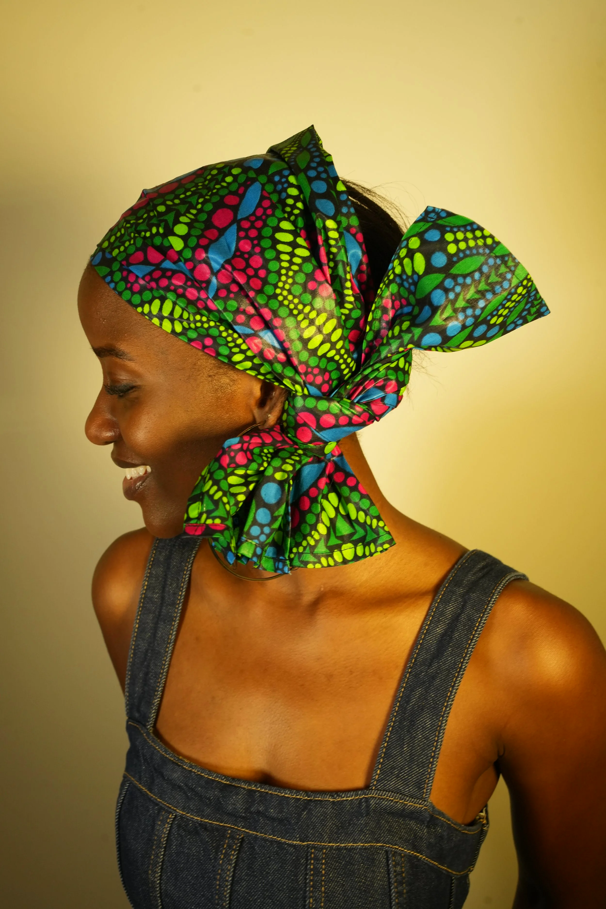 Side view of woman wearing a headwrap
