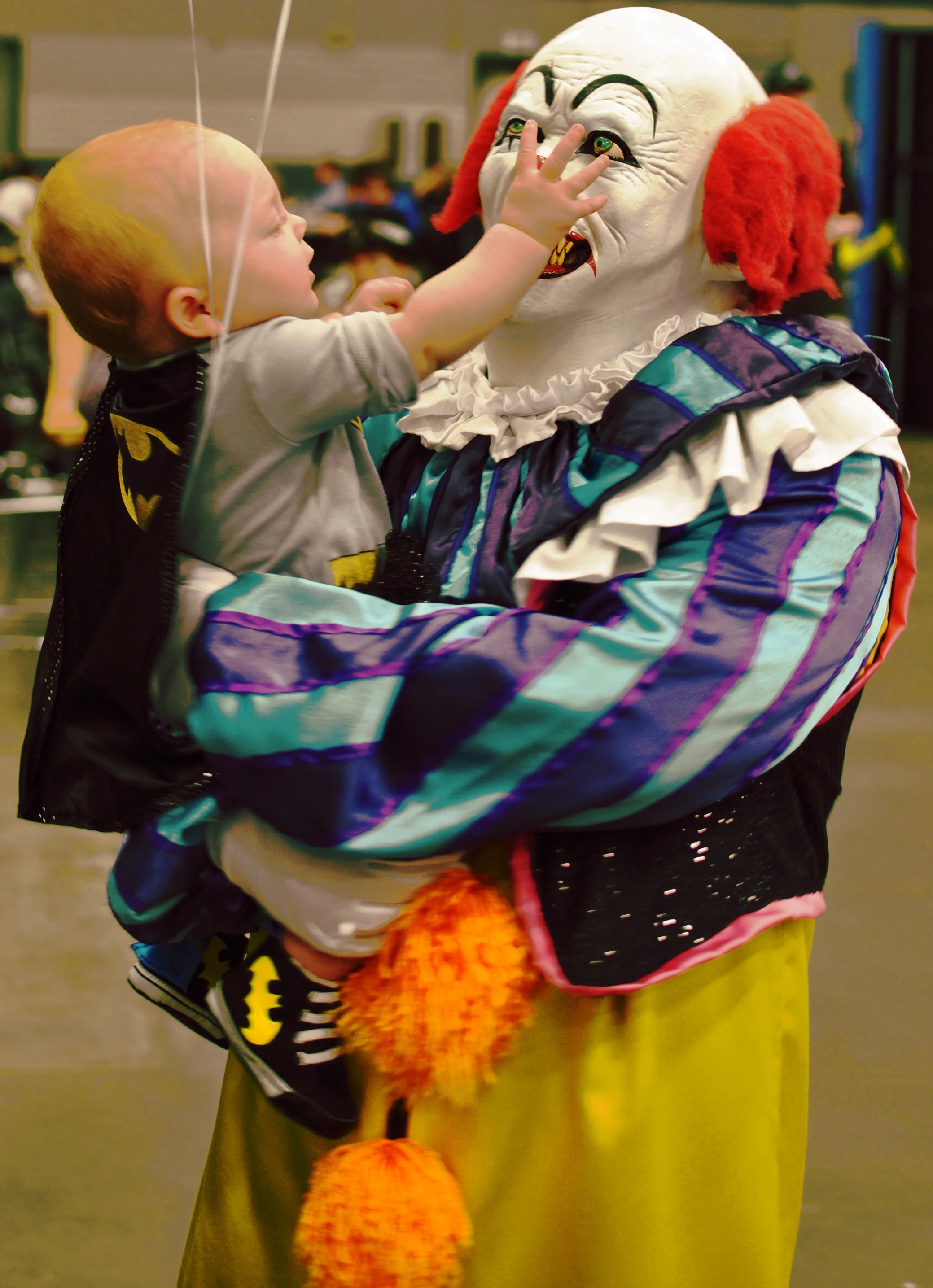 Here, a mutant hides his deformities with face paint in order to abduct a young child he will undoubtedly eat later.
