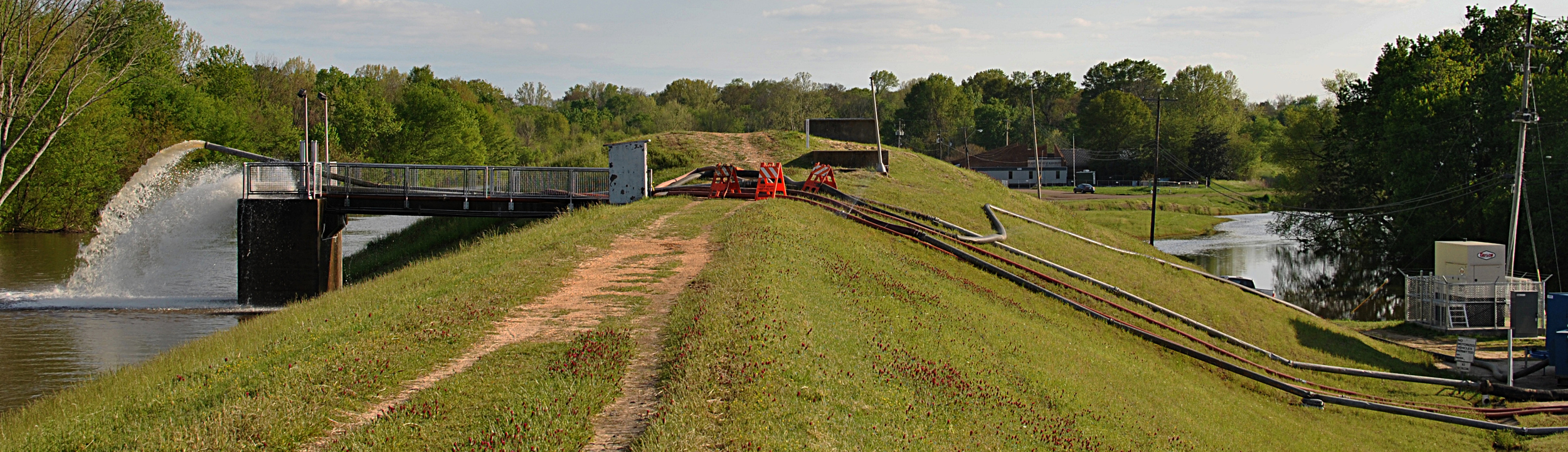 Pictured: A totally tenable long term solution for a major metropolitan area flood control plan: Hoses.