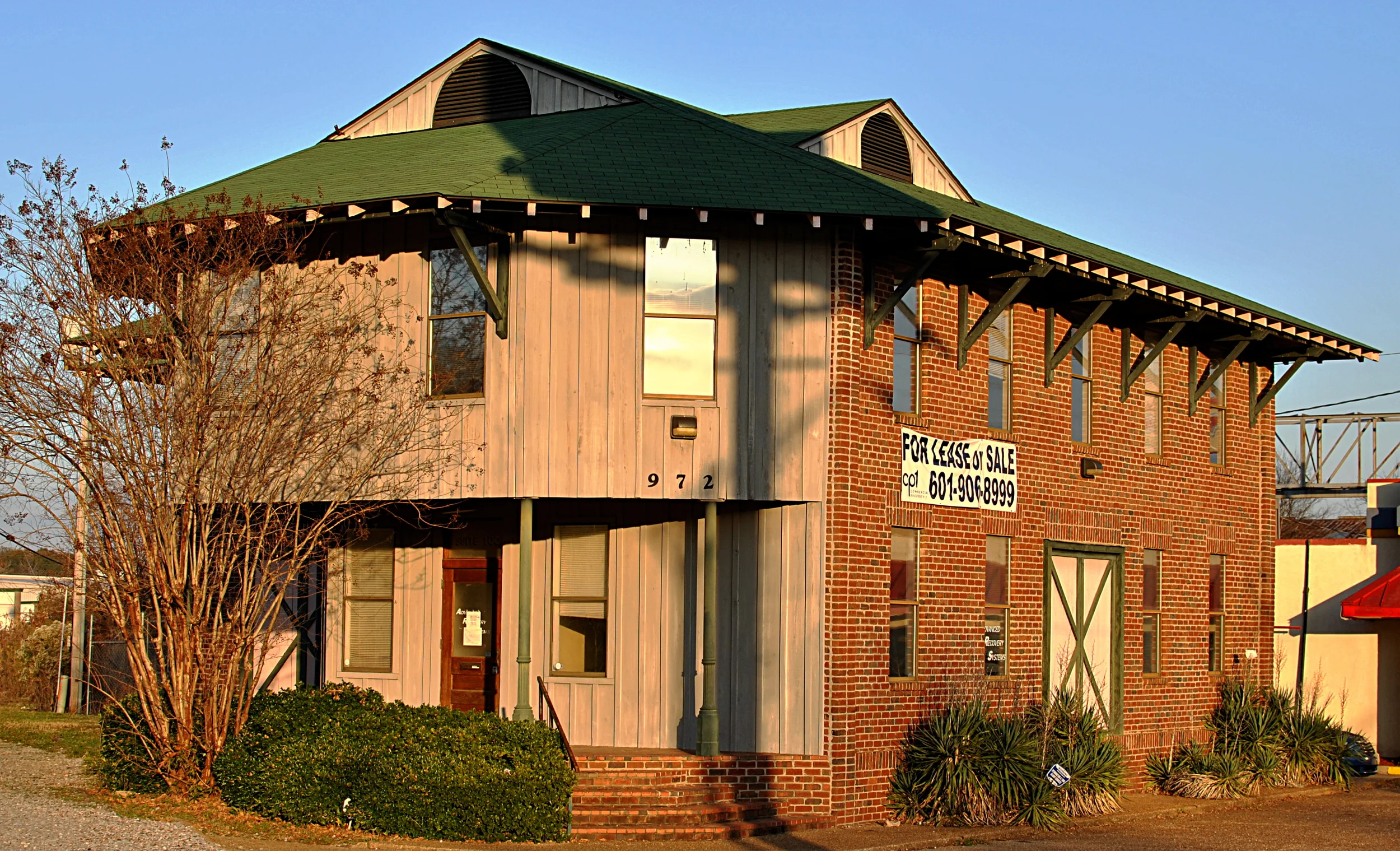 This building used to belong to a debt collection agency. I wonder who collects their debt after they go out of business? Wheels within wheels, man. Wheels within wheels.