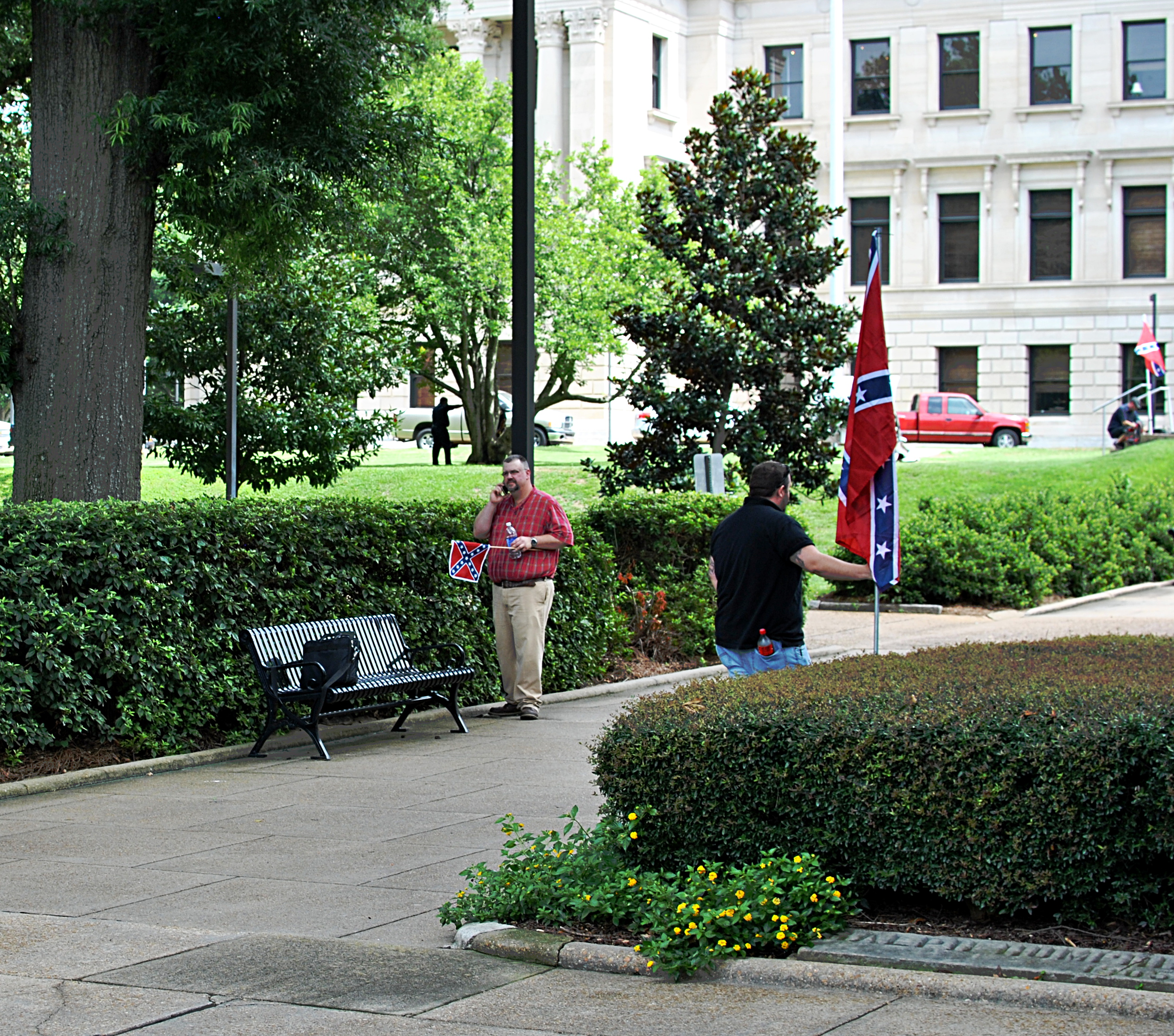 "Hi honey. Yes, I'm wearing my nice shirt. Yes, I brought the little flag you made me. No, the Jew Media won't talk to me, either."