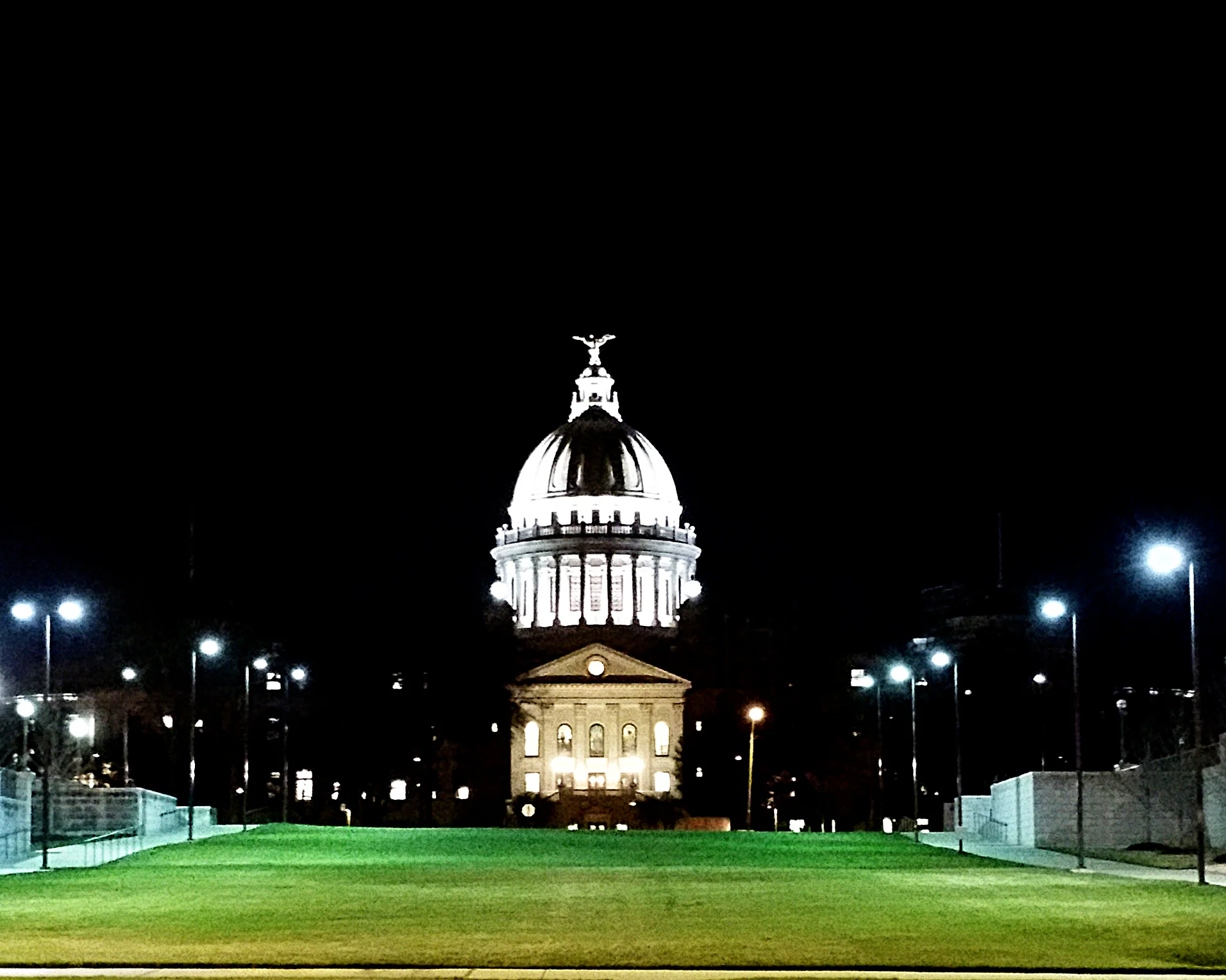 The State Capitol, shrouded in darkness for what it has done.