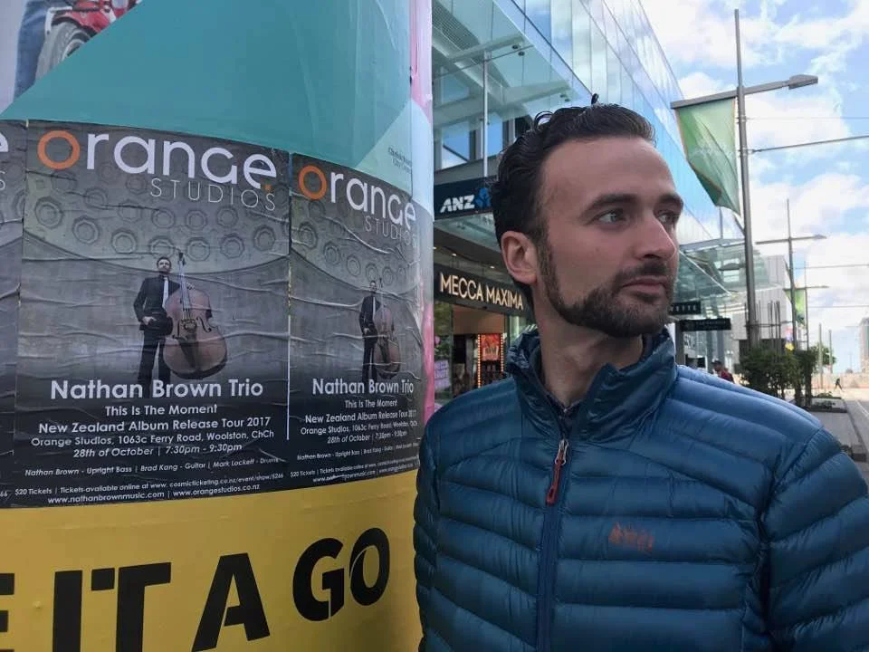 Nathan next to posters that were put up around Christchurch NZ