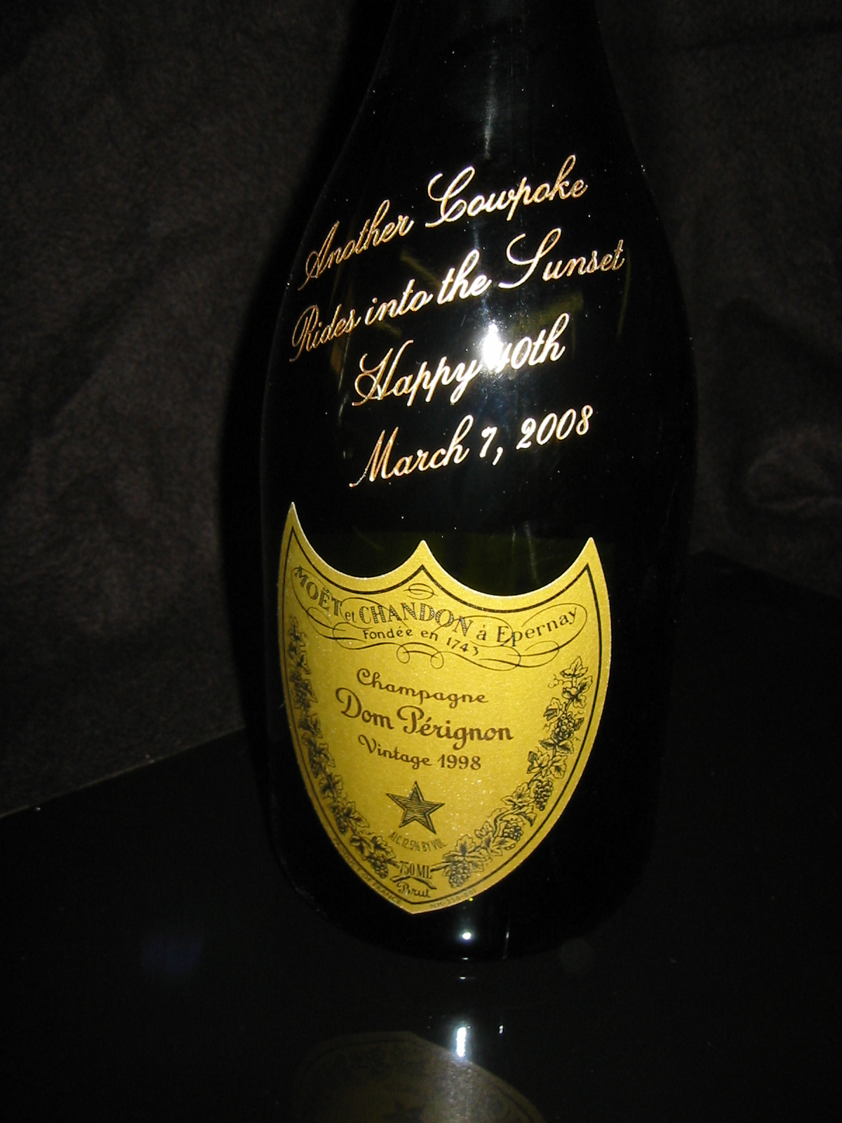 Sandblasted and paint filled champagne bottle.jpg