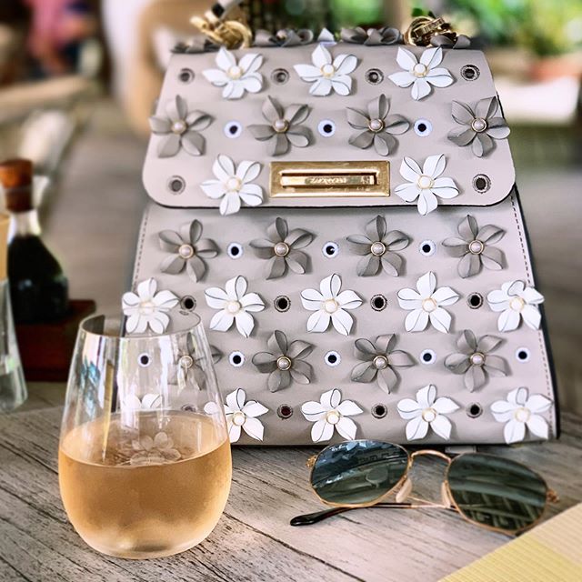 Obsessed with this @zaczacposen floral convertible backpack from @renttherunway... it&rsquo;s perfect for ros&eacute; season! 🎒🌹🍷 #renttherunway #zaczacposen #summervibes #ros&eacute;season