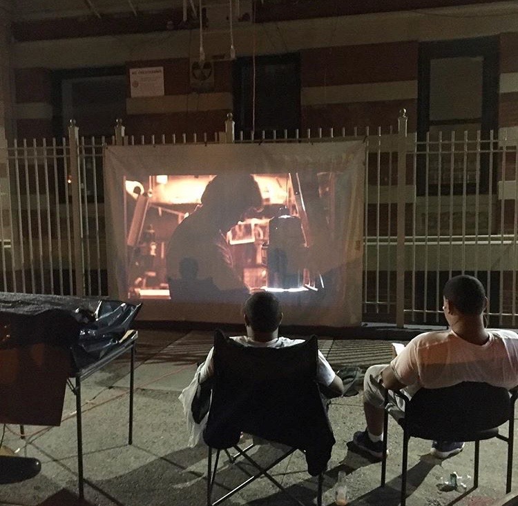 @pjp1717Watching a video in front of the building at 101st & Manhattan Avenue #makingplaceuws