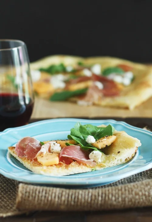 Melon + Prosciutto Flatbread with Arugula + Goat Cheese — Set the Table