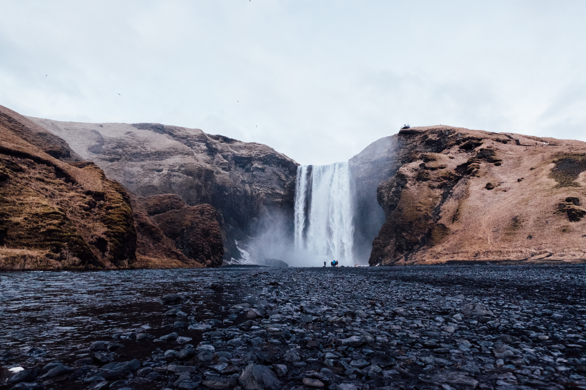  Next stop: Skogafoss! This waterfall is about 200 feet high and also easily accessible from Ring Road. Sadly we got here right after the sun set, so we didn’t get too much time to check it out before it got dark.  