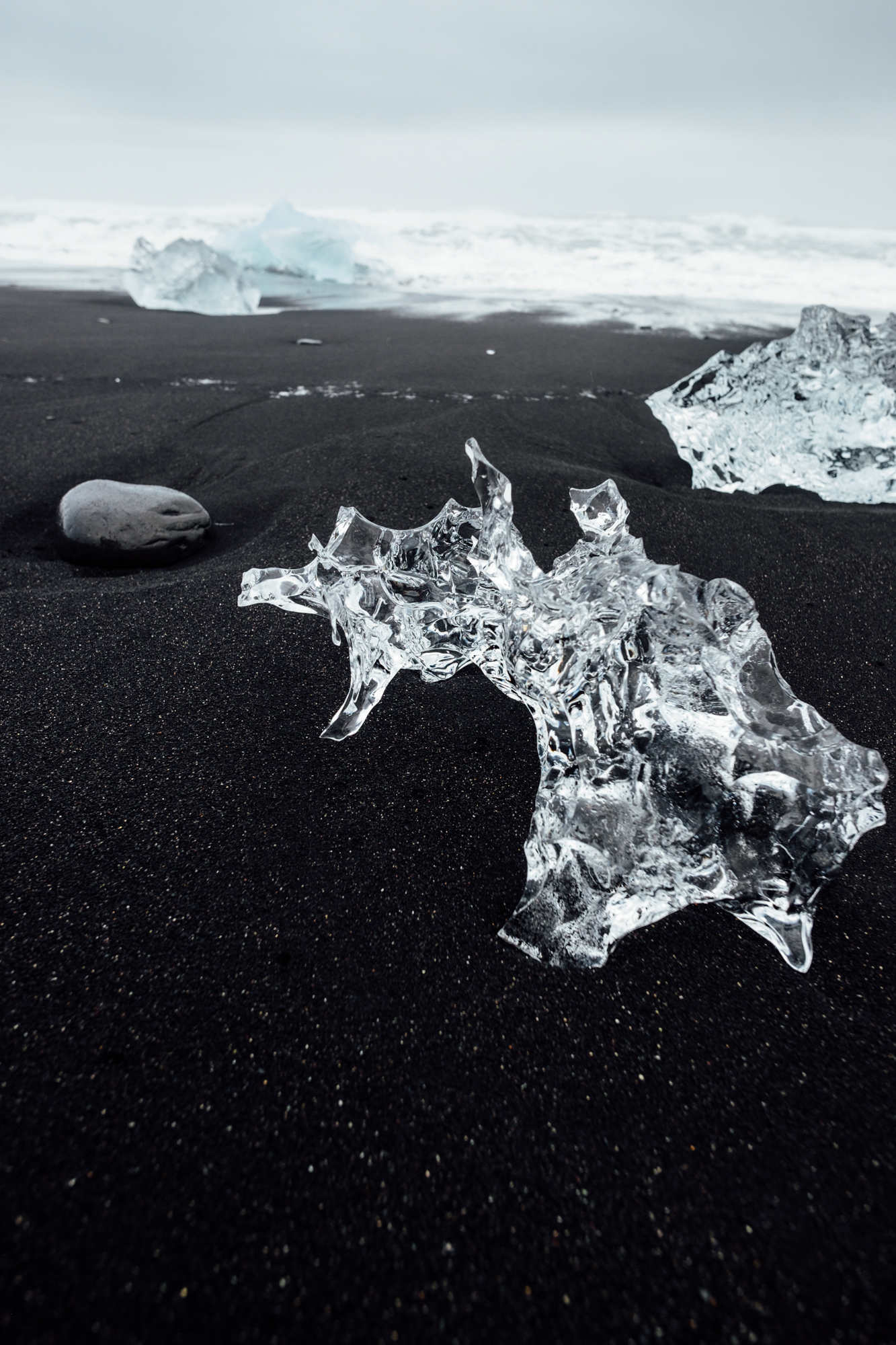  Diamond beach did not disappoint. The beach gets its namesake from the large chunks ice that get stranded on the beach while drifting out towards the ocean from the Jokulsarlon Glacier Lagoon (we did that next).  