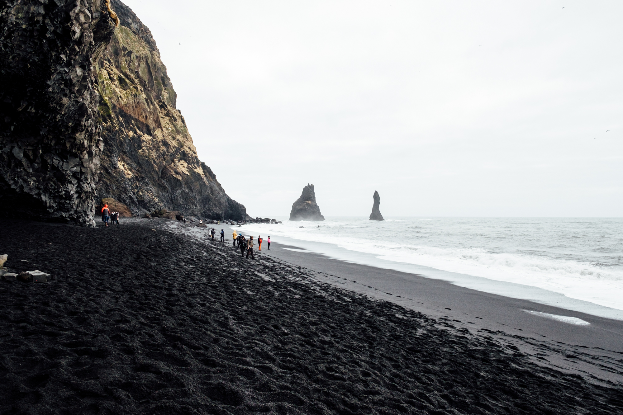  Looking Eastward down the beach towards Reynisdrangar, large rock formations just off the shore in Vik. These rocks are home to a ton of birds, including Puffins in the summer! 