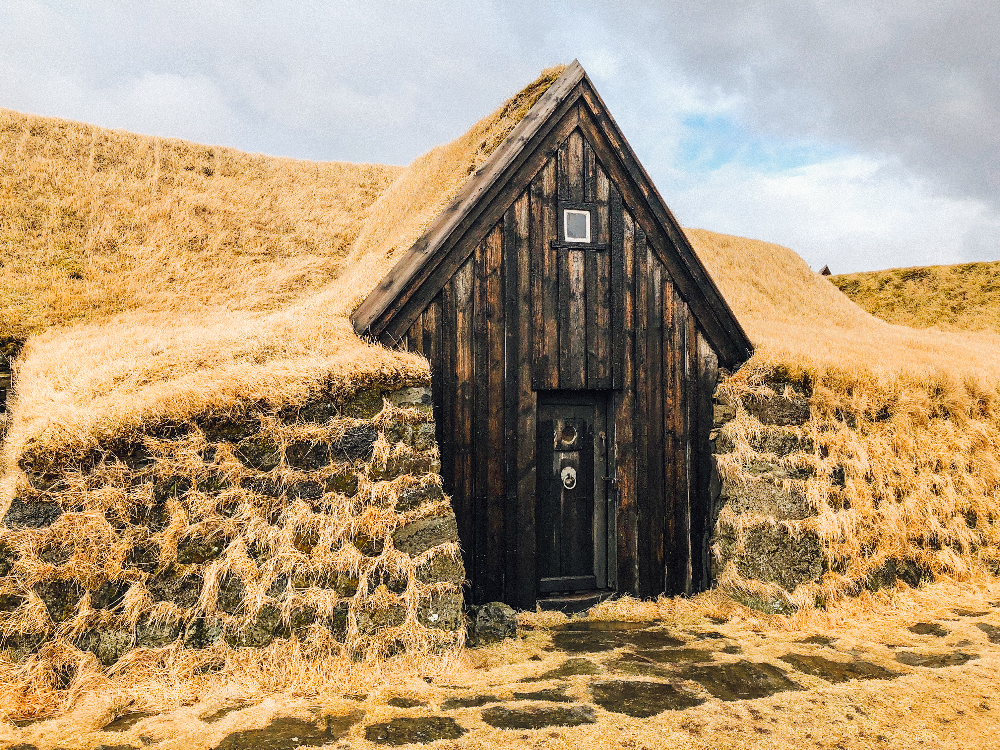 Quick shot of one of the beautiful Keldur Turf Houses. The original structures are very old, but the homes were rebuilt in about 1912 after an earthquake shook the houses.