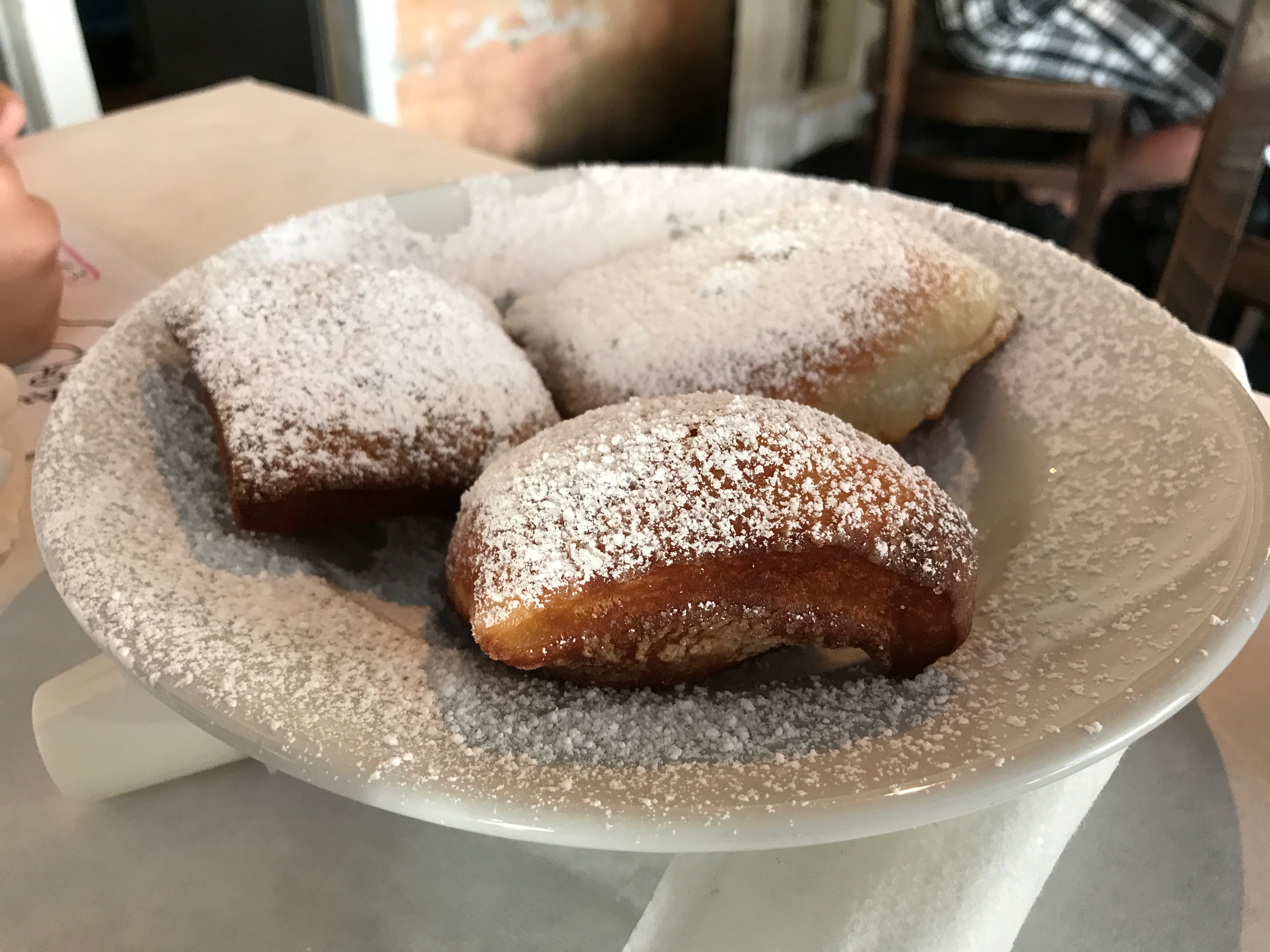 Beignets dusted with powdered sugar