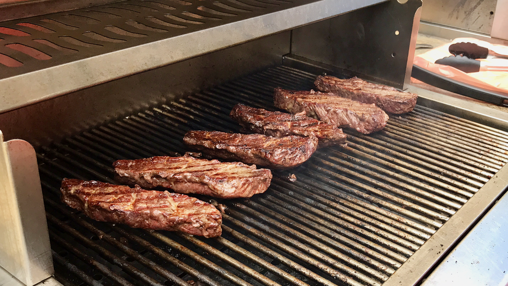   Grilling steaks  