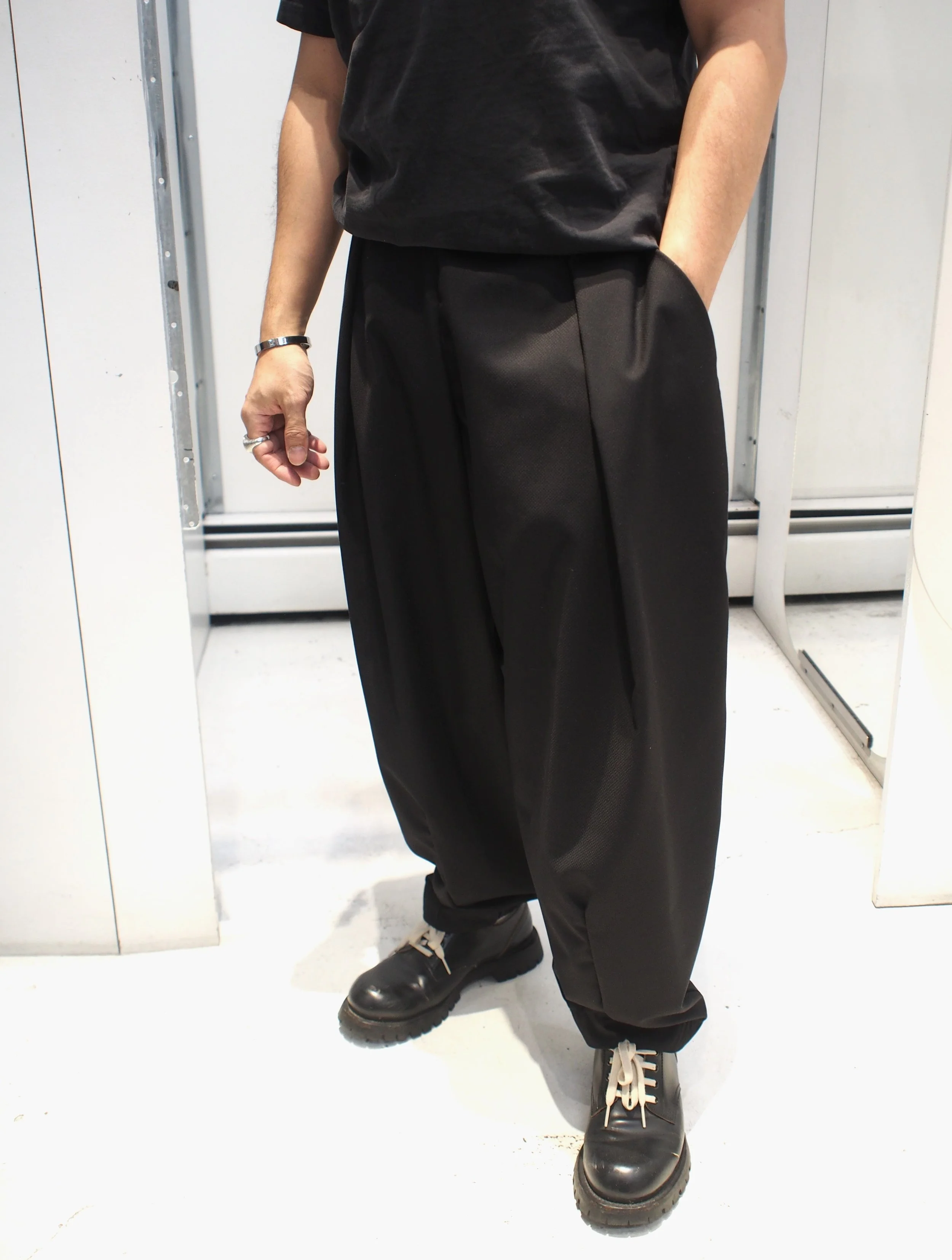 Lotus Eaters MINOAN pleated loose tapered jacquard pants - Black