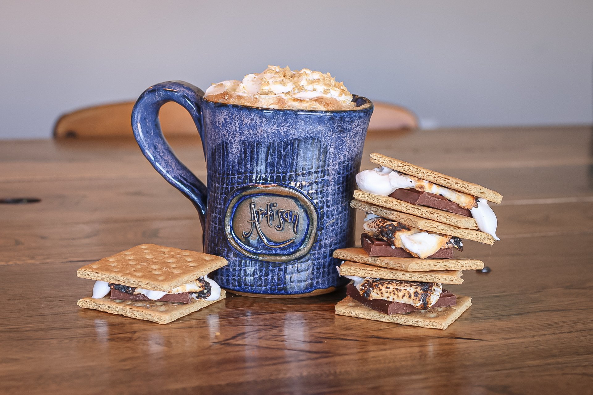 Can you believe it's already time for our new featured drink menu? First up in our introductions is the crowd favorite S'mores Mocha! 🍫☕️

Made with toasted marshmallow and mocha syrups, espresso, and milk, and topped with whipped cream and graham c