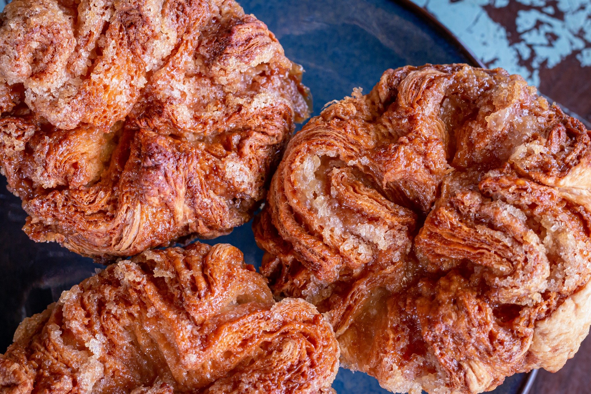 It's that time again! Our special pastry this weekend is the crowd favorite Kouign Amann. 

These buttery, flaky, caramelly confections will be available beginning tomorrow morning, APRIL 26TH, through Saturday, APRIL 27TH, while supplies last.

If y