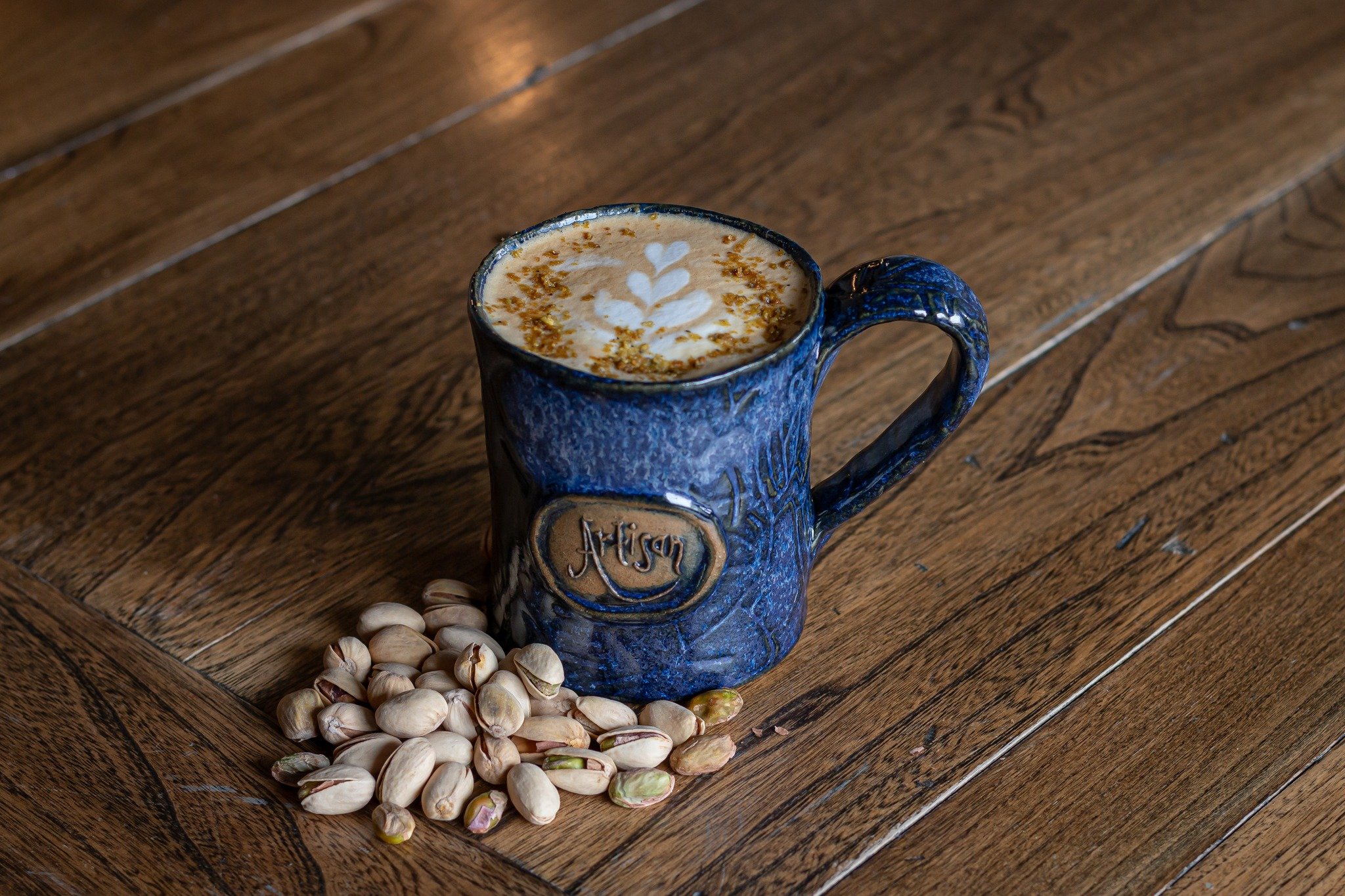 Brand new to the featured menu is our Pistachio Latte! 🍵

We are really excited about this one. It comes with our house-made pistachio syrup and features our light roast espresso! We finish it off with milk, of course, and it is topped with pistachi