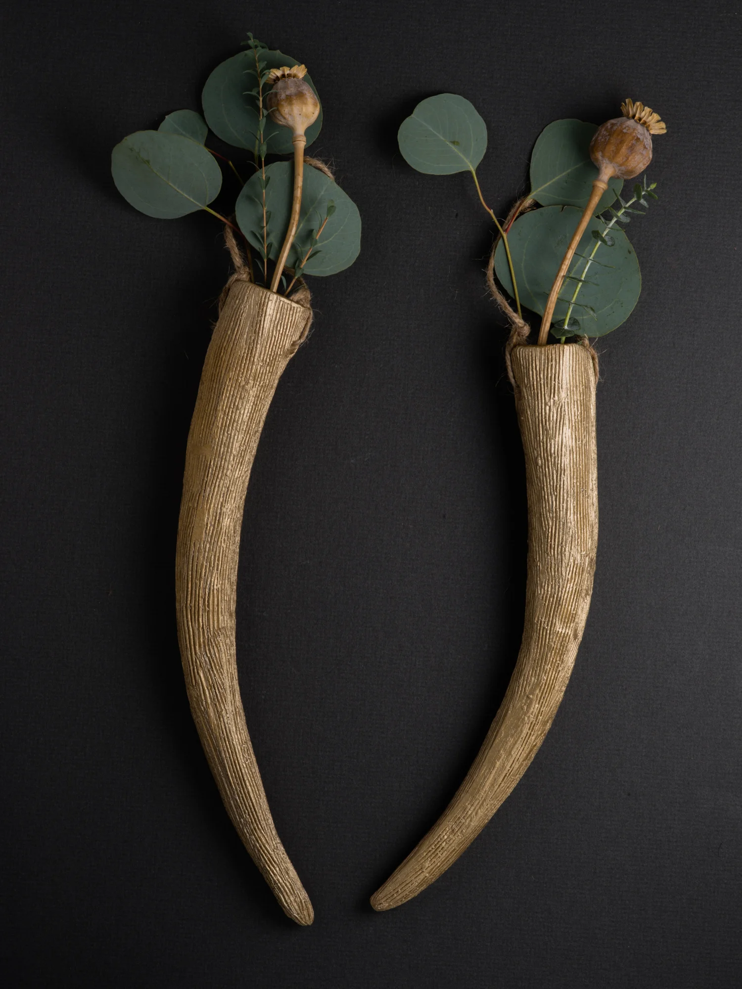 These abstracted antlers and horns are inspired by growing up in North Carolina, where I often stumbled upon shed deer antlers in the vast woods of the region. Each antler and horn is hand carved from clay, making them one of a kind. These hanging antler sets are designed to hang and hold flowers or air plants. You can buy the set or a single antler, these beautiful and unique pieces add a rustic touch to any home, becoming the center piece of any room. If you don't see a color or size you like, I can make custom sculptures tailored specifically to your aesthetic. 