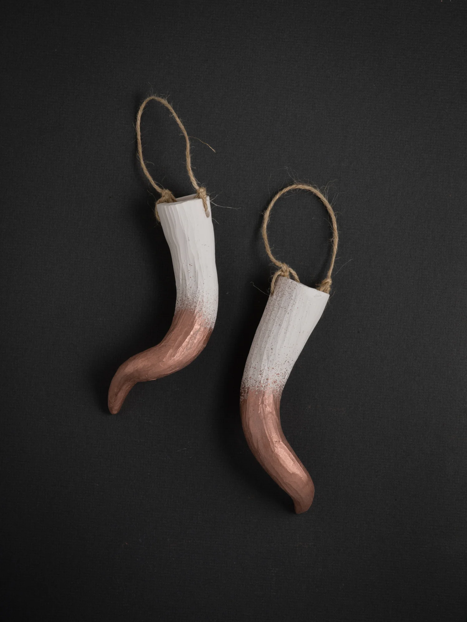 These abstracted antlers and horns are inspired by growing up in North Carolina, where I often stumbled upon shed deer antlers in the vast woods of the region. Each antler and horn is hand carved from clay, making them one of a kind. These hanging antler sets are designed to hang and hold flowers or air plants. You can buy the set or a single antler, these beautiful and unique pieces add a rustic touch to any home, becoming the center piece of any room. If you don't see a color or size you like, I can make custom sculptures tailored specifically to your aesthetic. 