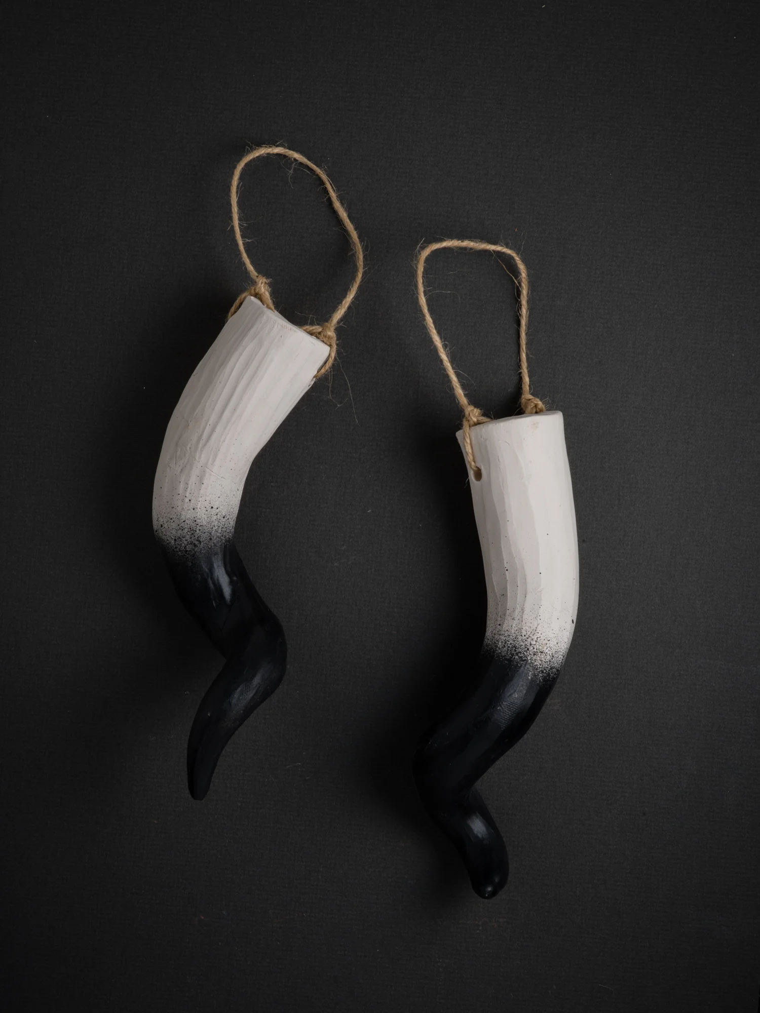 These abstracted antlers and horns are inspired by growing up in North Carolina, where I often stumbled upon shed deer antlers in the vast woods of the region. Each antler and horn is hand carved from clay, making them one of a kind. These hanging antler sets are designed to hang and hold flowers or air plants. You can buy the set or a single antler, these beautiful and unique pieces add a rustic touch to any home, becoming the center piece of any room. If you don't see a color or size you like, I can make custom sculptures tailored specifically to your aesthetic. 