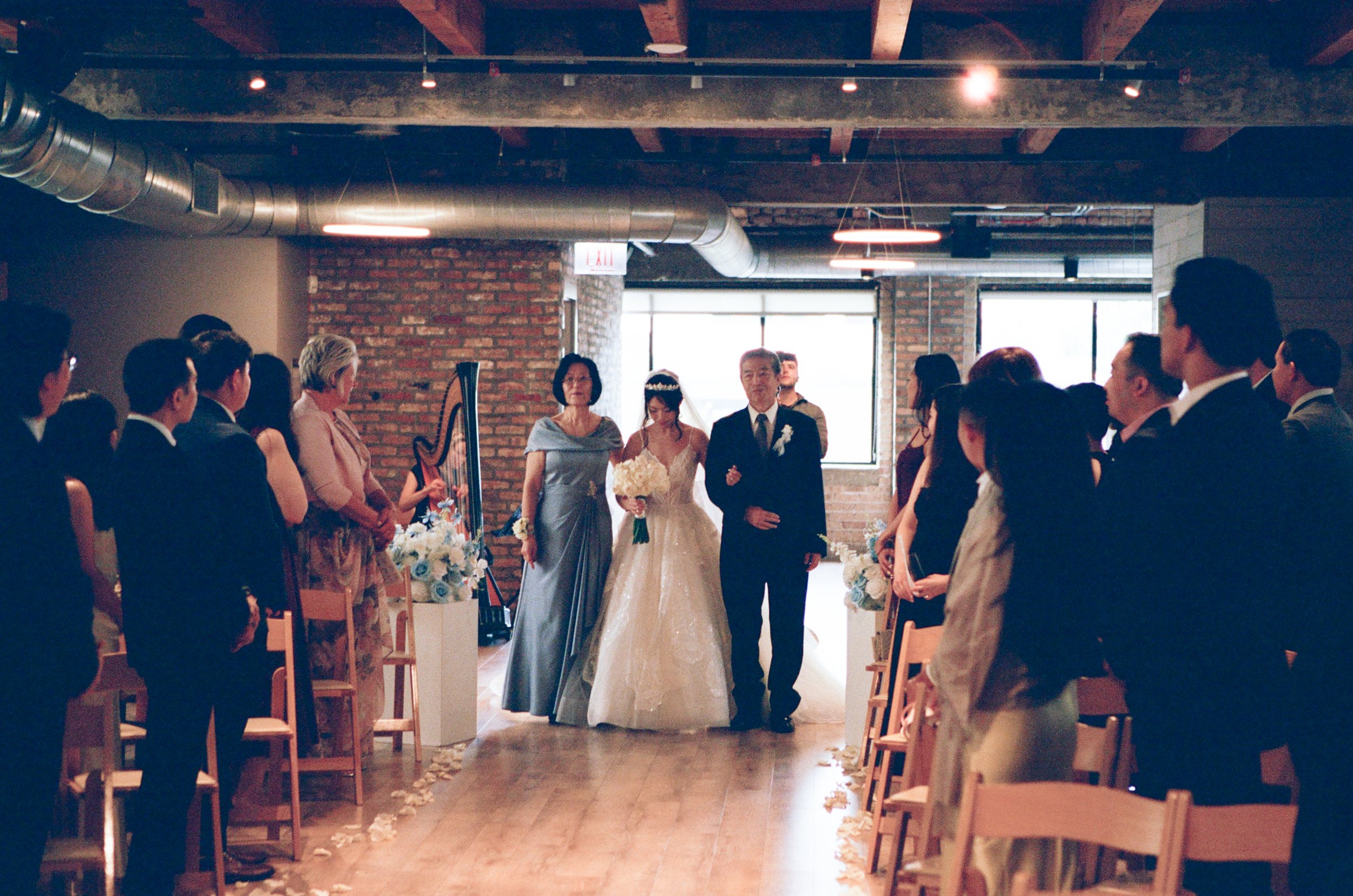 Alice walked down the aisle to her favorite song, “Still Life” by BIGBANG, performed live on harp.