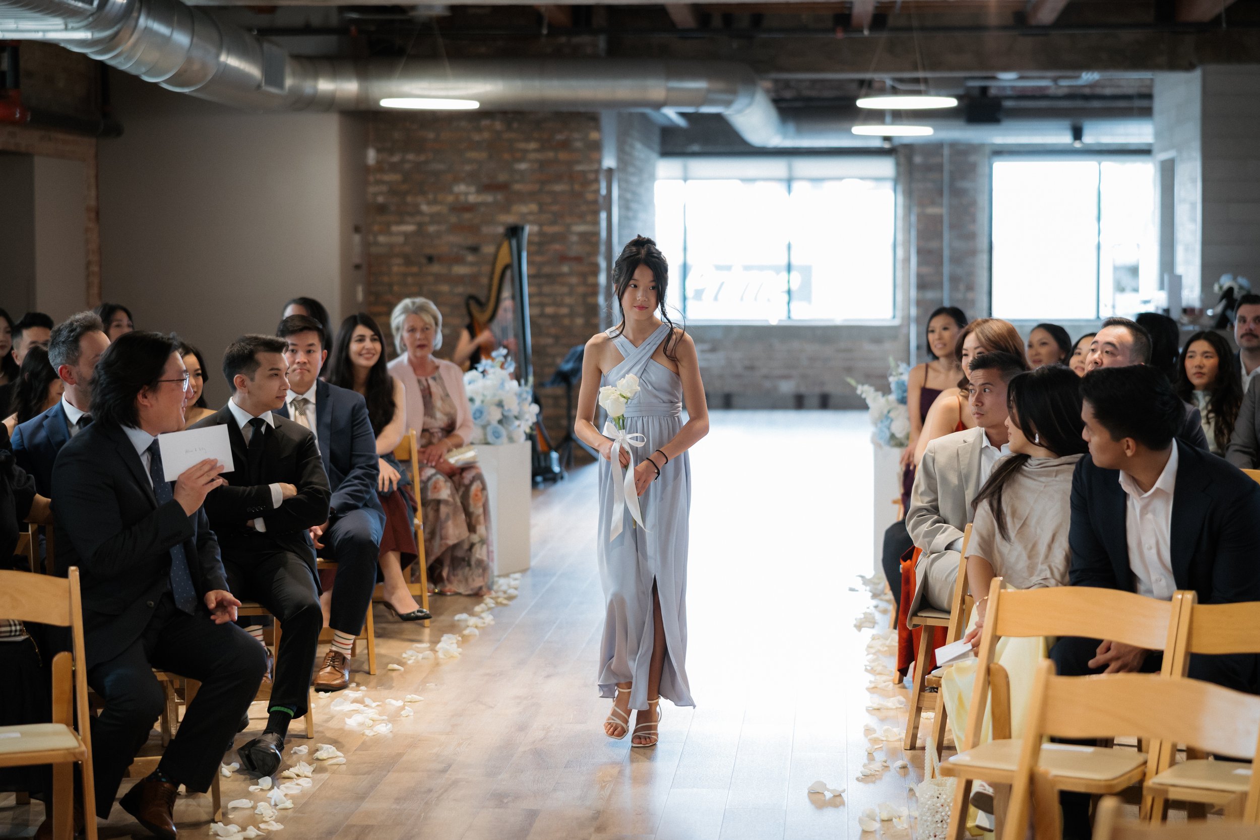 The wedding party processed to “River Flows in You” performed live on harp.