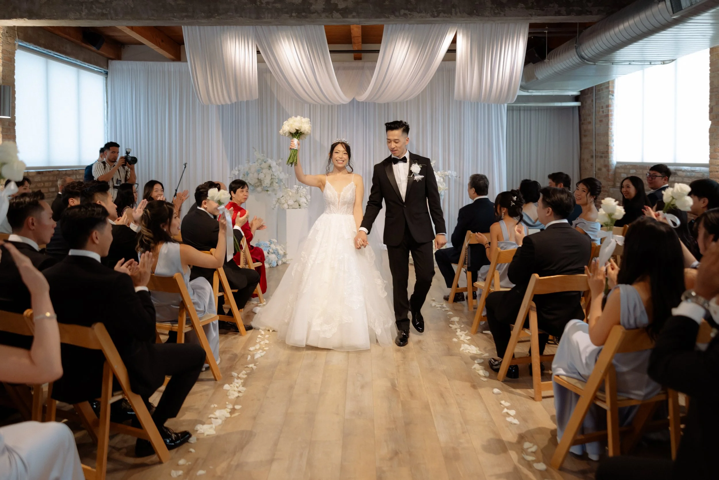 The newlyweds celebrated with “Love Me Like You Do” as their live harp recessional.