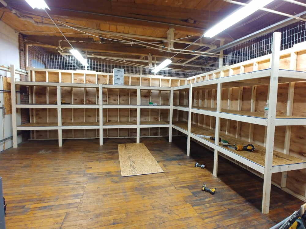March 11, 2018. New shelving built to accommodate expanded Archives Annex. Jim Nigzus was in charge of the work crew that included Dan Hyde, Fred Brown, Jimmy Nigzus, Richard Nichols, and Paul Kosciolek. Staff photo