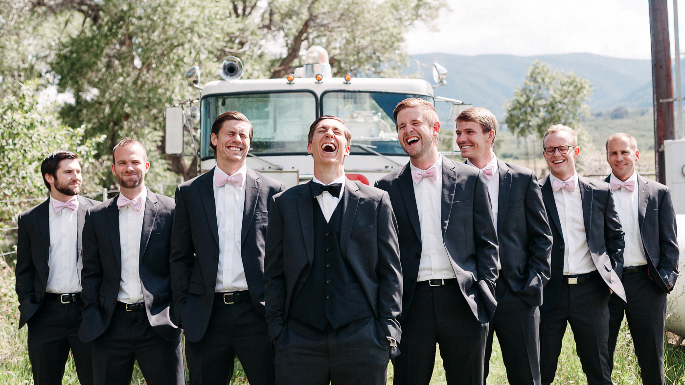 133-wiens-ranch-wedding-groosmen-laughing.jpg