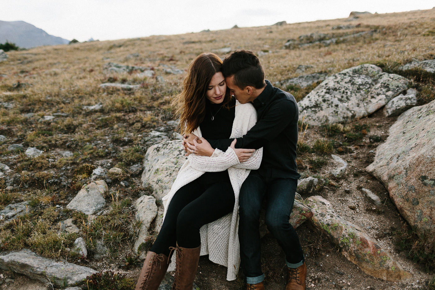 Couple Embracing on Rock on Trail Ridge Road