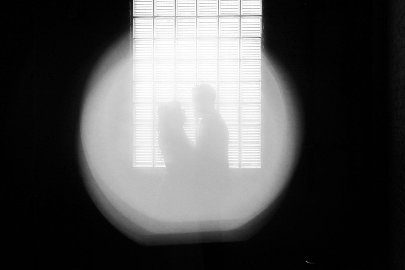 Studios at Overland Crossing Wedding Bride and Groom Window Portrait