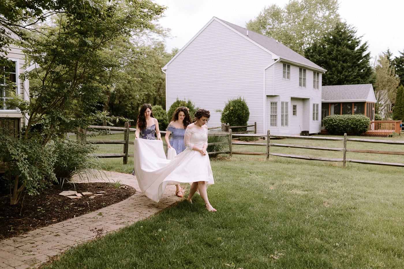 Bride and sisters first look