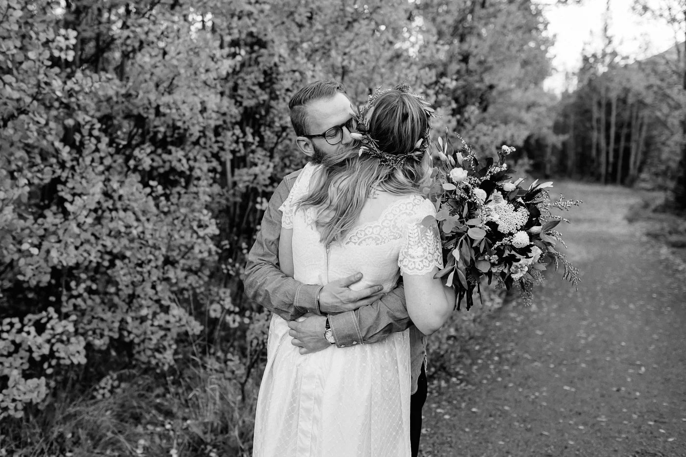 First look bride hugging groom