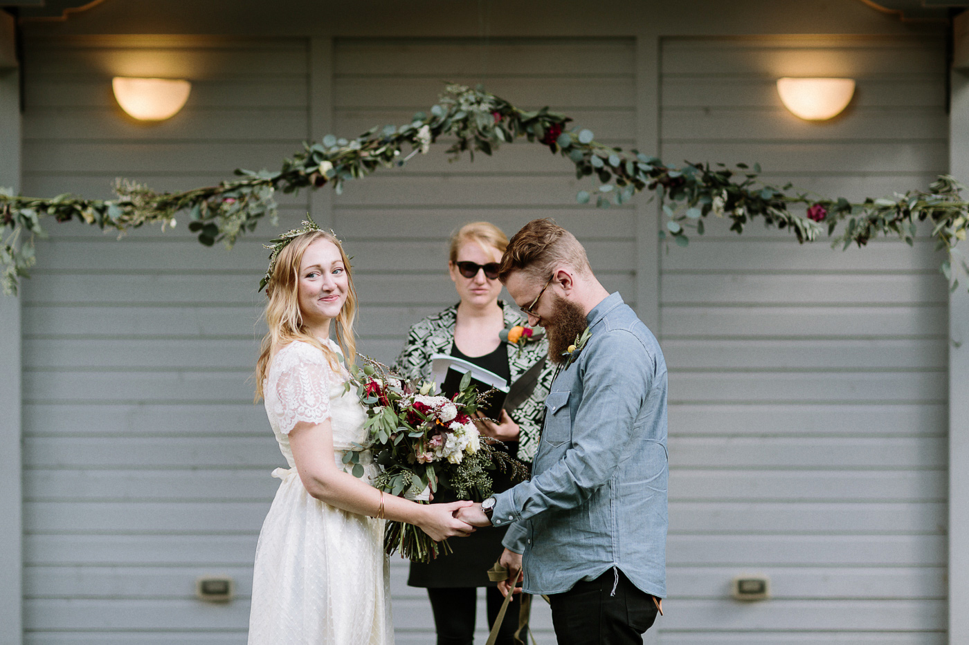 Bride and groom holding hands