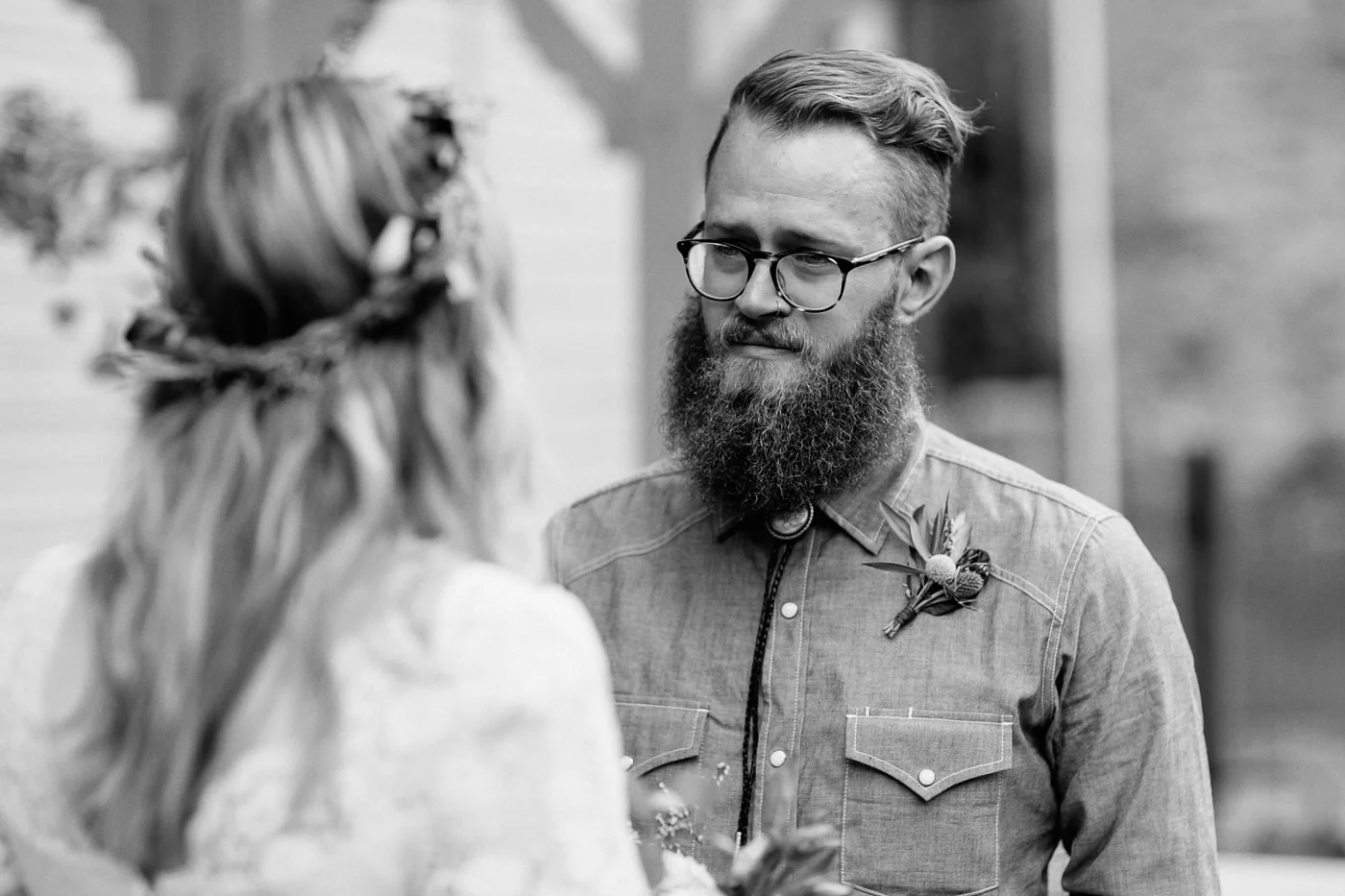 Groom tearing up during vows