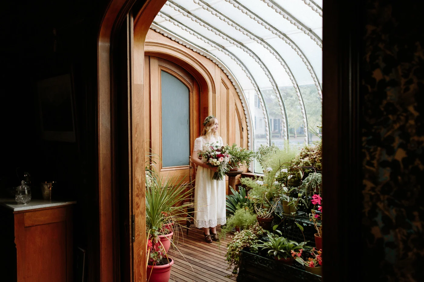Hamill House bride in conservatory with flowers
